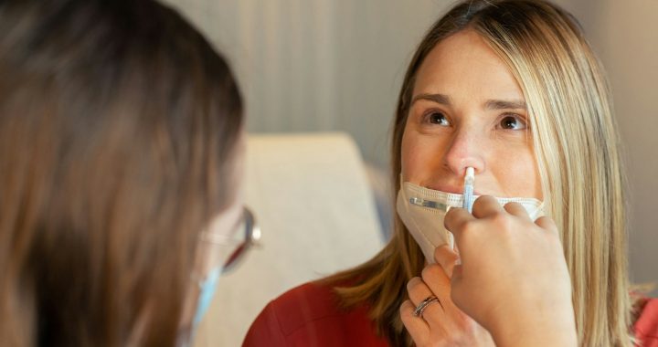 a woman in a red shirt and a woman in a white shirt