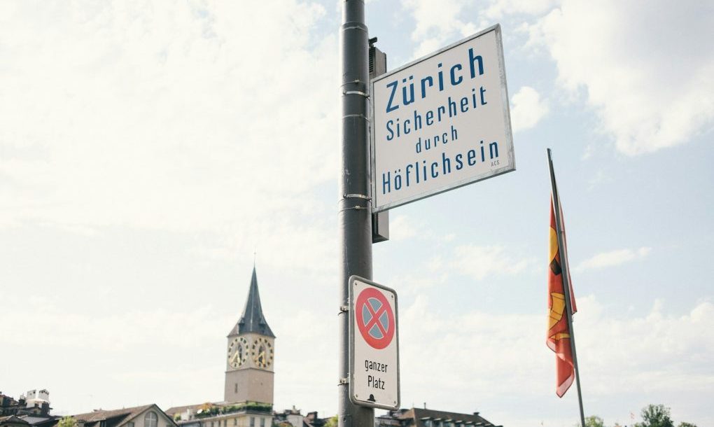 blue and white street sign